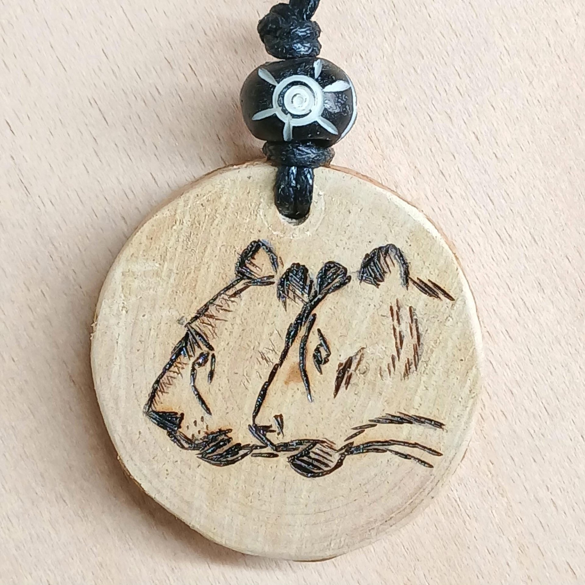 Hand Drawn Cave Lion Wood Pendant